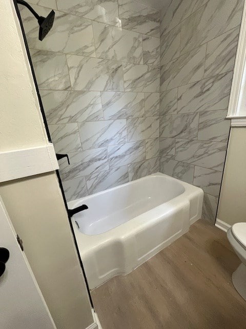 3015 Walker St, Columbus, GA 31903 - full bath featuring wood finished floors and shower / tub combination