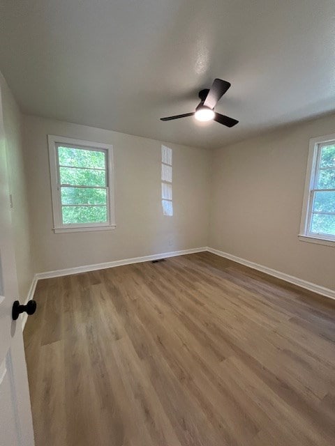 3015 Walker St, Columbus, GA 31903 - empty room with wood finished floors and ceiling fan