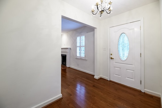 1820 Overlook St, Columbus, GA 31906 - foyer featuring a chandelier, wood finished floors, and a fireplace