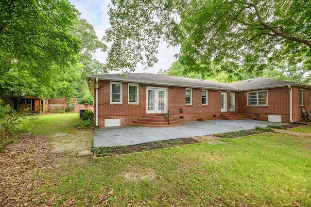 1820 Overlook St, Columbus, GA 31906 - back of property with french doors, entry steps, crawl space, a patio, and brick siding