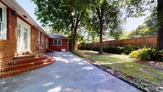 1820 Overlook St, Columbus, GA 31906 - fenced backyard with a patio area and french doors