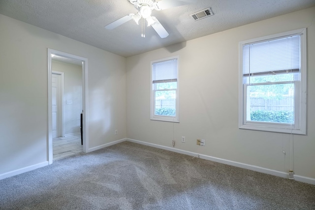 1820 Overlook St, Columbus, GA 31906 - empty room featuring carpet, ceiling fan, and a textured ceiling