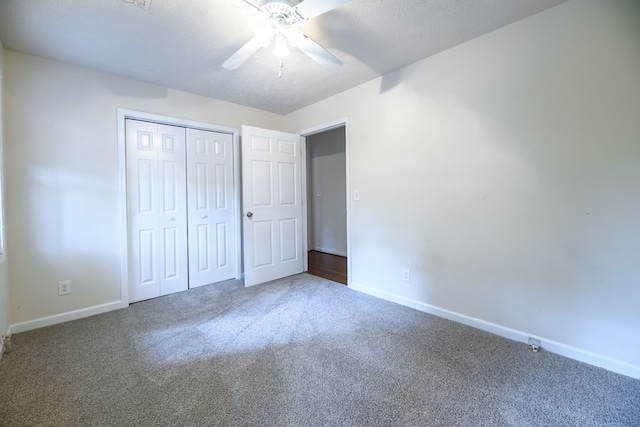 1820 Overlook St, Columbus, GA 31906 - unfurnished bedroom with carpet, a closet, a textured ceiling, and a ceiling fan