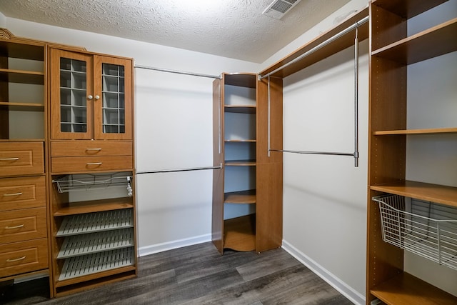 1820 Overlook St, Columbus, GA 31906 - walk in closet with dark wood finished floors