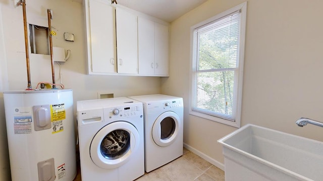 1820 Overlook St, Columbus, GA 31906 - laundry area featuring electric water heater, cabinet space, healthy amount of natural light, and washing machine and dryer