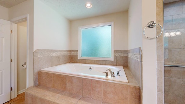 1820 Overlook St, Columbus, GA 31906 - bathroom with a bath and tile patterned flooring