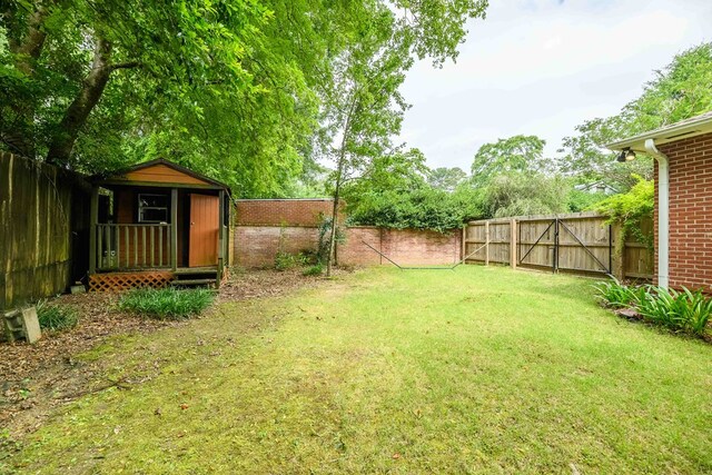 1820 Overlook St, Columbus, GA 31906 - fenced backyard with a storage unit