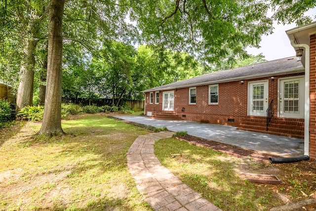 1820 Overlook St, Columbus, GA 31906 - view of yard featuring entry steps, a patio, and french doors