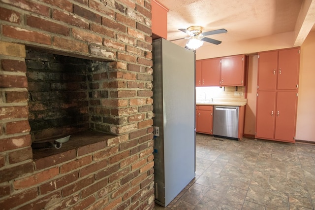 kitchen with stainless steel dishwasher, ceiling fan, and brick wall