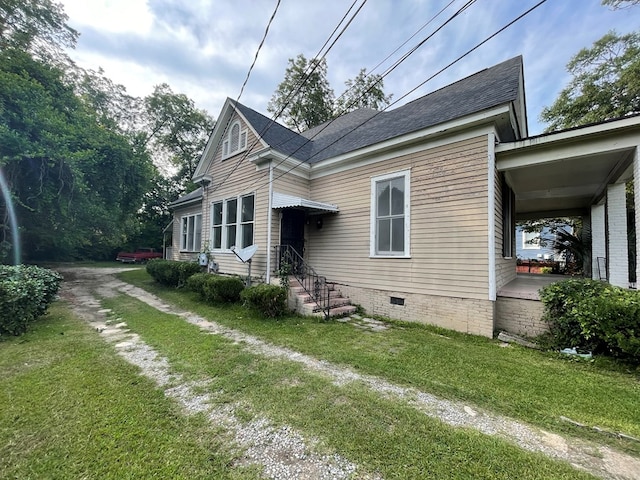 view of front of home with a front yard