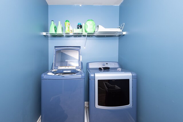 9 Red Maple St, Phenix City, AL 36869 - laundry area featuring washer and clothes dryer