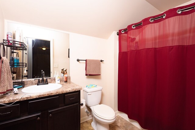 9 Red Maple St, Phenix City, AL 36869 - bathroom featuring toilet, vanity, a shower with curtain, tile patterned flooring, and vaulted ceiling