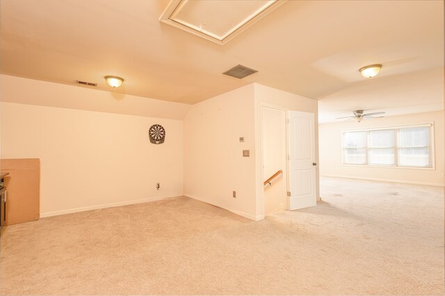 9 Red Maple St, Phenix City, AL 36869 - empty room featuring light colored carpet, ceiling fan, baseboards, and lofted ceiling