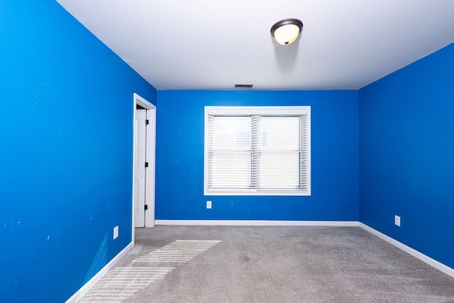 9 Red Maple St, Phenix City, AL 36869 - spare room featuring carpet floors and baseboards