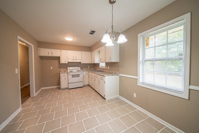 kitchen featuring tasteful backsplash, pendant lighting, an inviting chandelier, white cabinets, and white electric range