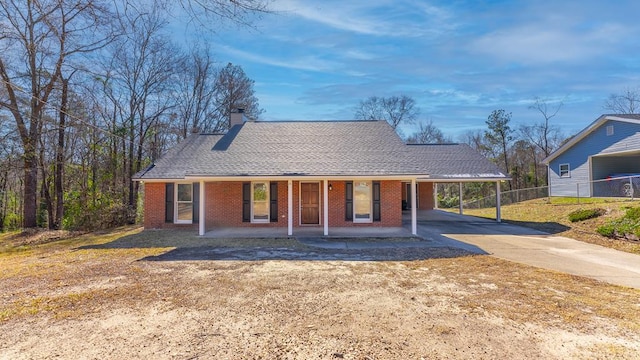 single story home featuring a porch