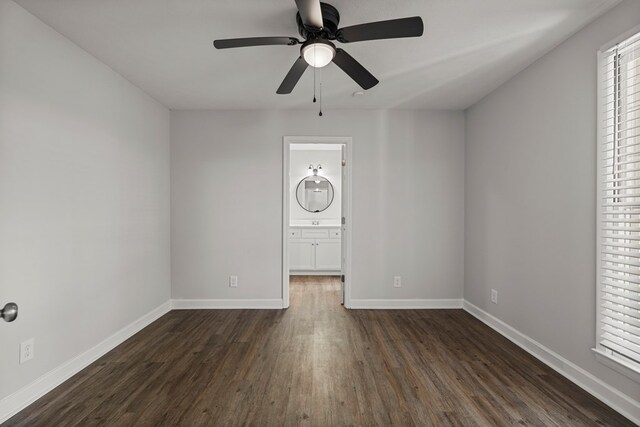 989 Lee Road 0213, Phenix City, AL 36870 - unfurnished room featuring dark wood finished floors, a ceiling fan, and plenty of natural light