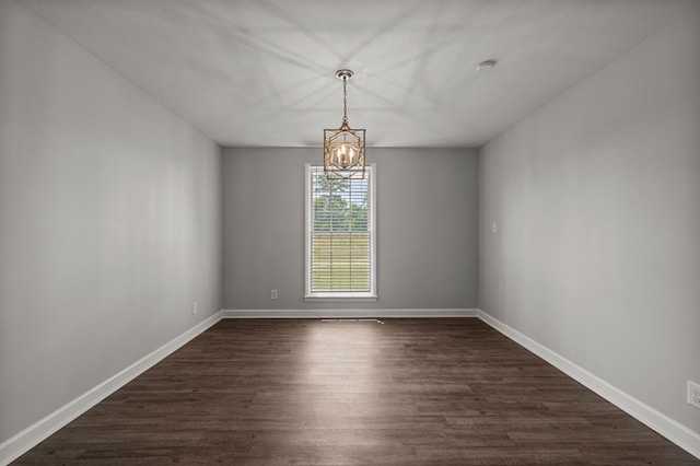 989 Lee Road 0213, Phenix City, AL 36870 - unfurnished room featuring a chandelier, dark wood finished floors, and a smoke detector