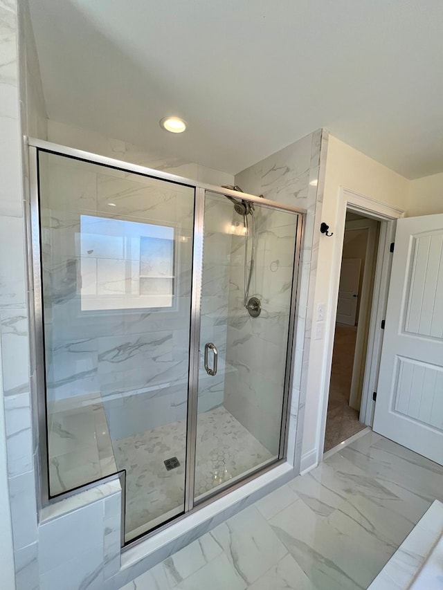 bathroom featuring walk in shower