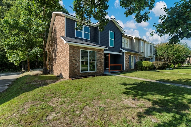 6344 Olde Towne Dr, Columbus, GA 31907 - view of front of home with brick siding and a front yard