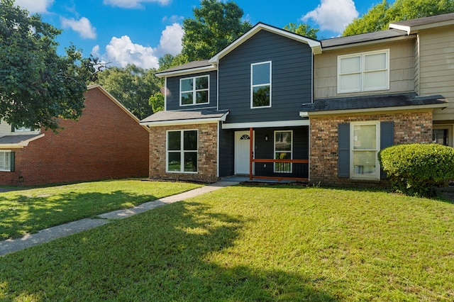 6344 Olde Towne Dr, Columbus, GA 31907 - view of front of home with brick siding, a porch, and a front lawn