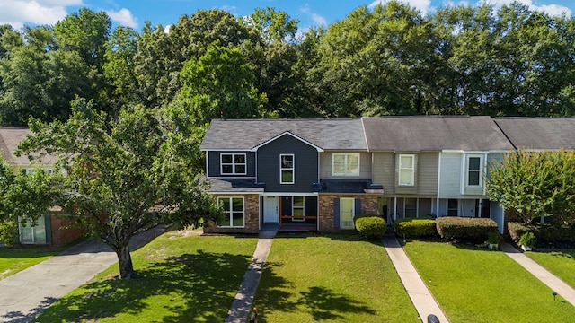 6344 Olde Towne Dr, Columbus, GA 31907 - townhome / multi-family property with a front yard, brick siding, and driveway