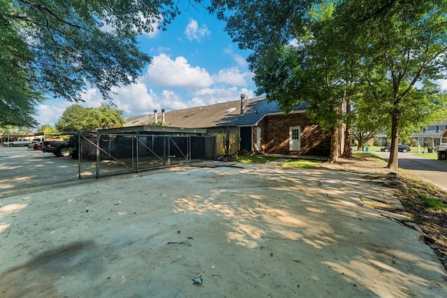 6344 Olde Towne Dr, Columbus, GA 31907 - back of house featuring a gate and covered parking
