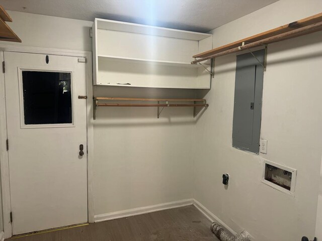 3328 College Ave, Columbus, GA 31907 - washroom featuring electric panel, hookup for a washing machine, and dark wood-style flooring
