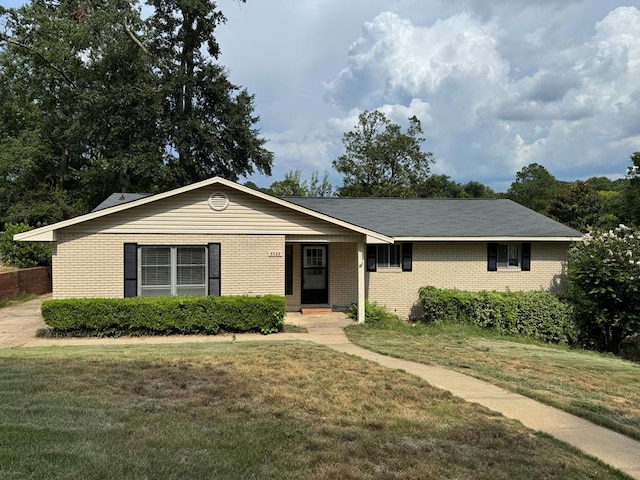 3328 College Ave, Columbus, GA 31907 - ranch-style home featuring brick siding and a front lawn