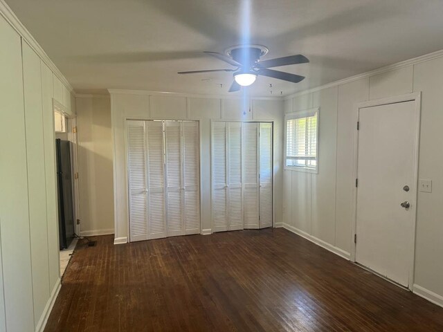 3328 College Ave, Columbus, GA 31907 - unfurnished bedroom with hardwood / wood-style floors, crown molding, multiple closets, and a ceiling fan