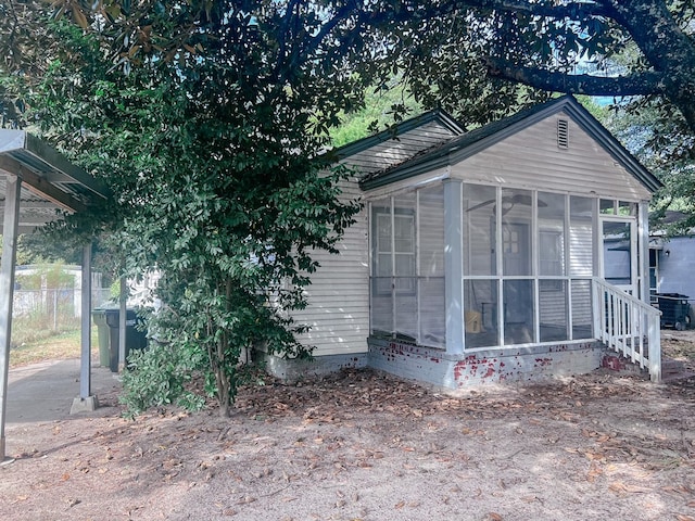 427 Bernard Dr, Columbus, GA 31903 - view of side of property with a sunroom and a central AC unit