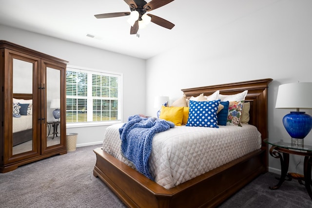 carpeted bedroom featuring ceiling fan