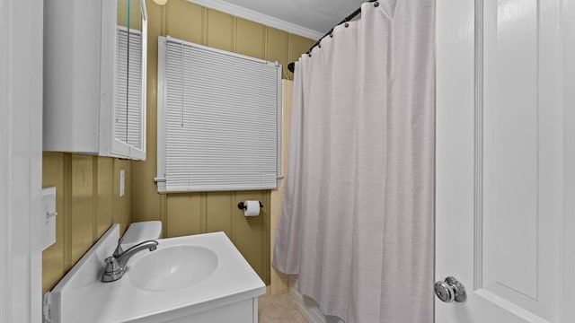 203 Patton Dr, Americus, GA 31719 - bathroom featuring vanity and ornamental molding