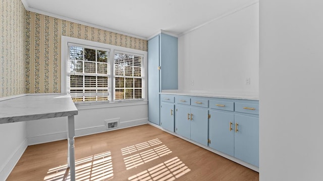 203 Patton Dr, Americus, GA 31719 - unfurnished office featuring light hardwood / wood-style floors and crown molding