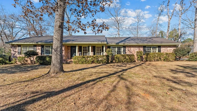 203 Patton Dr, Americus, GA 31719 - ranch-style house with a front lawn