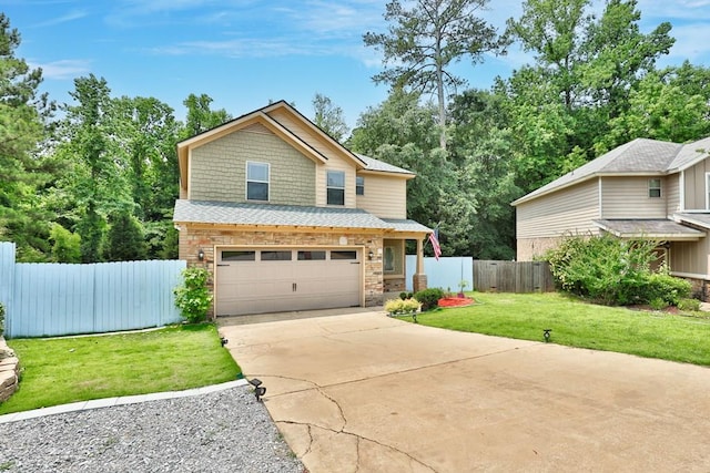 7177 Helen Dr, Columbus, GA 31904 - view of front facade featuring an attached garage, stone siding, and driveway