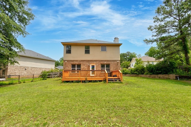 7177 Helen Dr, Columbus, GA 31904 - back of property featuring a chimney, brick siding, and a wooden deck