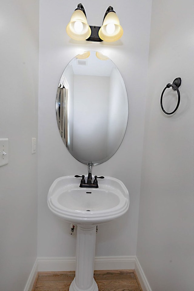 7177 Helen Dr, Columbus, GA 31904 - bathroom with wood finished floors and baseboards