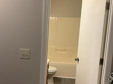 3514 Youmans St, Columbus, GA 31903 - bathroom featuring vanity and bathtub / shower combination