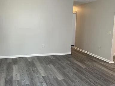 3514 Youmans St, Columbus, GA 31903 - spare room with dark wood-style flooring