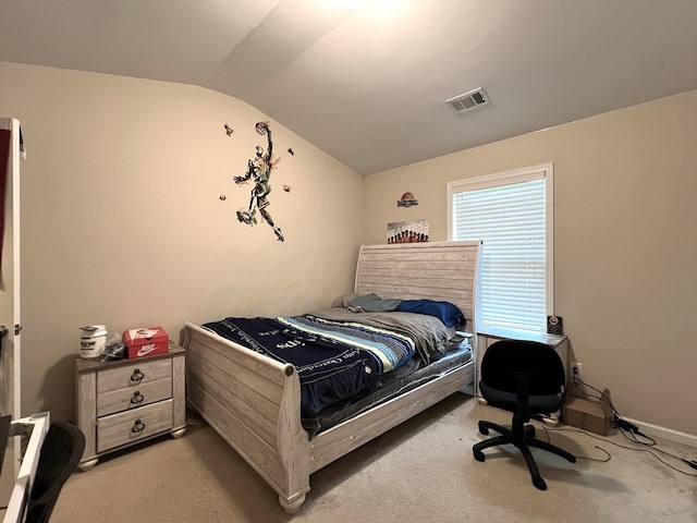 19 Pebblebrook Ln, Fort Mitchell, AL 36856 - bedroom with lofted ceiling and light colored carpet