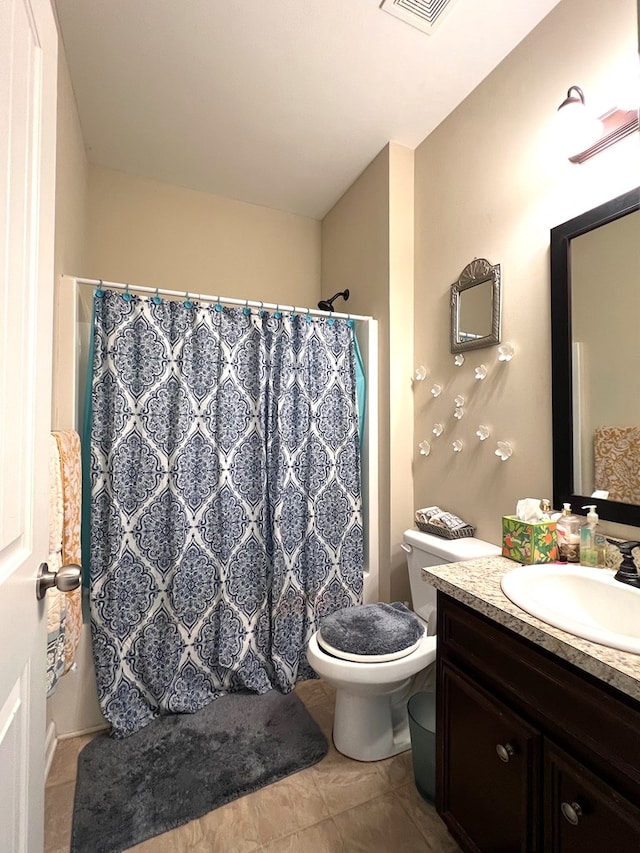 19 Pebblebrook Ln, Fort Mitchell, AL 36856 - bathroom featuring vanity, tile patterned floors, and a shower with shower curtain