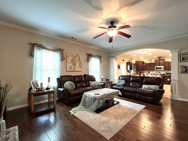 19 Pebblebrook Ln, Fort Mitchell, AL 36856 - living room featuring arched walkways, ceiling fan, dark wood-style flooring, and ornamental molding