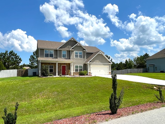 19 Pebblebrook Ln, Fort Mitchell, AL 36856 - craftsman-style house featuring board and batten siding, stone siding, concrete driveway, and a porch
