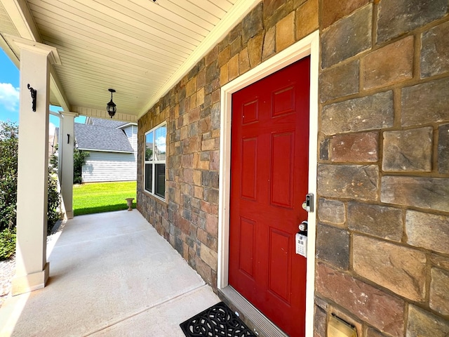 19 Pebblebrook Ln, Fort Mitchell, AL 36856 - doorway to property with a porch and stone siding