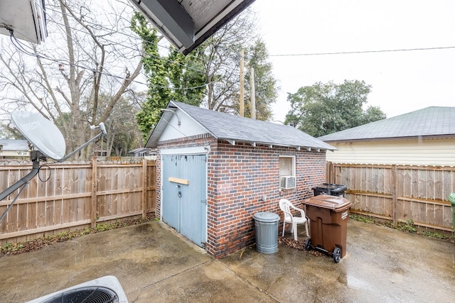 view of outbuilding featuring central AC