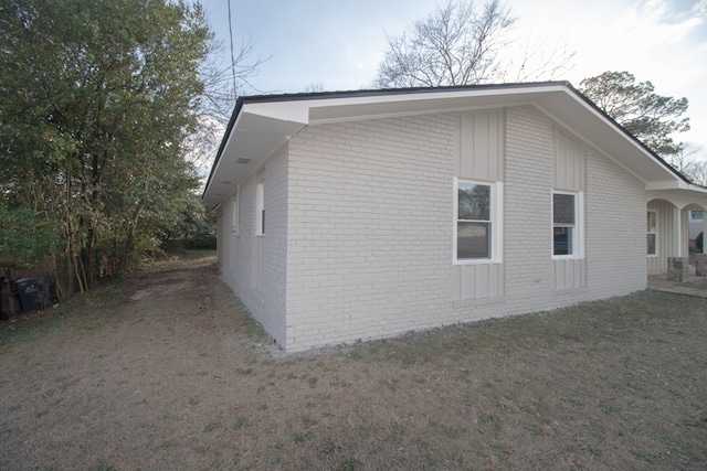 view of home's exterior featuring a yard