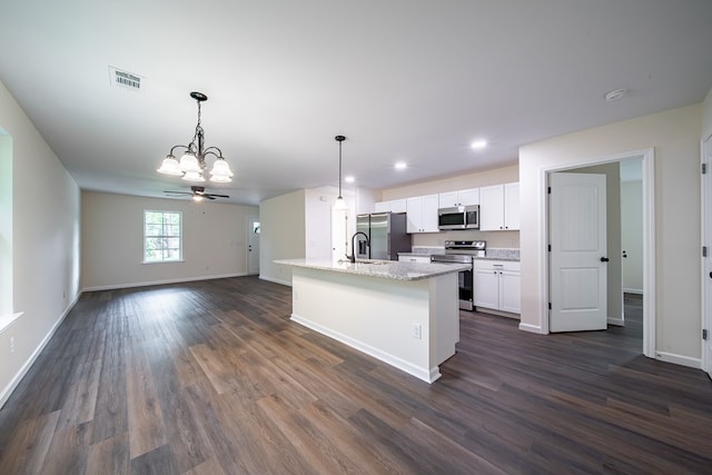 6900 Forrest Rd, Columbus, GA 31907 - kitchen featuring appliances with stainless steel finishes, a chandelier, white cabinets, dark wood-type flooring, and recessed lighting