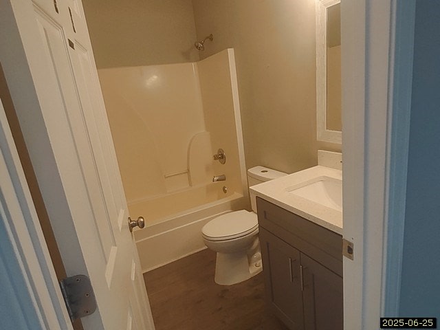 6123 Caribou Dr, Columbus, GA 31907 - full bath featuring vanity,  shower combination, and wood finished floors