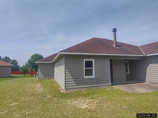 6123 Caribou Dr, Columbus, GA 31907 - back of house featuring a patio and a lawn